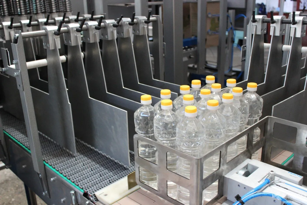 АФК-500 — автоматический упаковщик ПЭТ бутылок в картонную тару